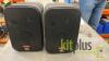 A pair of two JBL speakers - black