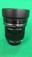 Olympus M.Zuiko 7-14mm f/2.8 lens with element caps and bag - 7