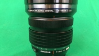 Olympus M.Zuiko 7-14mm f/2.8 lens with element caps and bag - 8