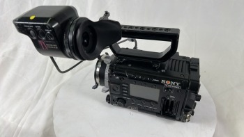 Sony PMW-F55 Broadcast Camera with DVF-EL100 Viewfinder, top handle and V-Lok battery backplate