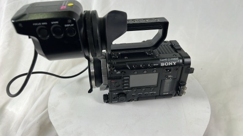 Sony PMW-F55 Broadcast Camera with DVF-EL100 Viewfinder, top handle and V-Lok battery backplate