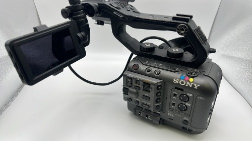 Sony FX6 camera body with Top handle, Monitor mount, monitor and side grip