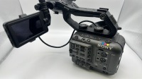 Sony FX6 camera body with Top handle,  Monitor mount, monitor and side grip