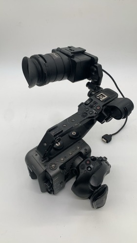 Sony FX6 camera body with top handle & side grip, monitor, monitor mount and viewfinder attachment. - NO case. No Battery