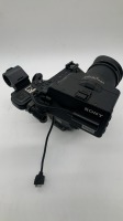 Sony FX6 camera body with top handle & side grip, monitor, monitor mount and viewfinder attachment. - NO case. No Battery